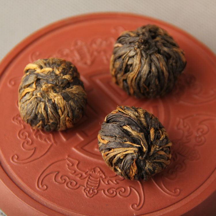 Wholesale Fengqing black tea Yunnan black tea tea handmade black tea small golden ball golden pimple red ball single bud tea