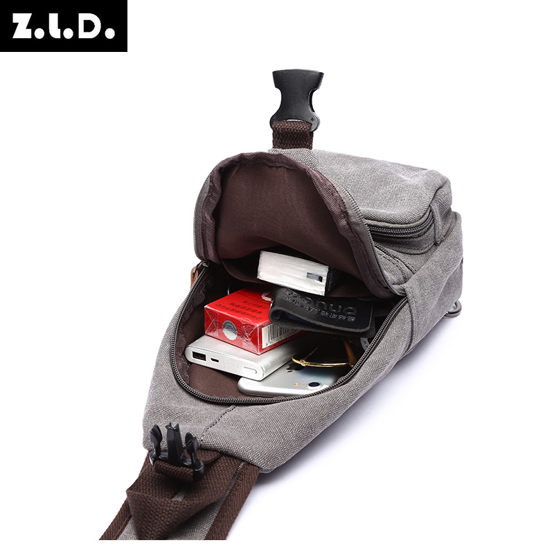 New men's shoulder bag casual canvas small chest bag fashion multi-functional usb Messenger bag factory a generation of hair