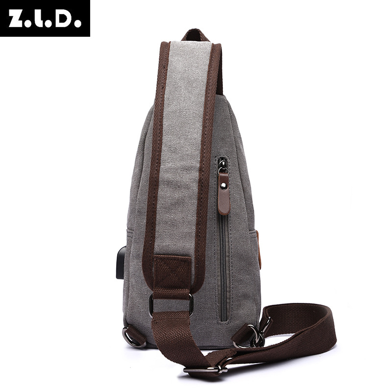 New men's shoulder bag casual canvas small chest bag fashion multi-functional usb Messenger bag factory a generation of hair