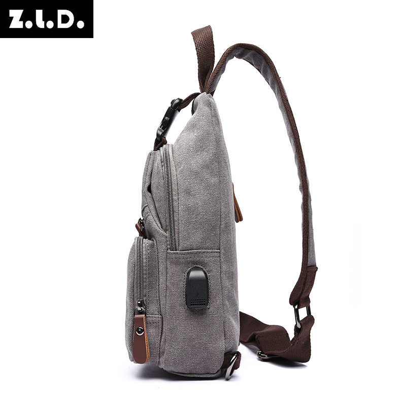 New men's shoulder bag casual canvas small chest bag fashion multi-functional usb Messenger bag factory a generation of hair