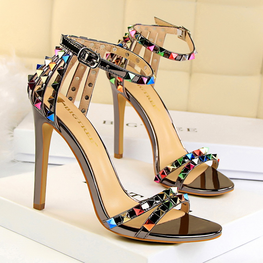 267-2 European and American style Roman style women's shoes stiletto heel ultra high heel open toe strap hollow color rivet sandals