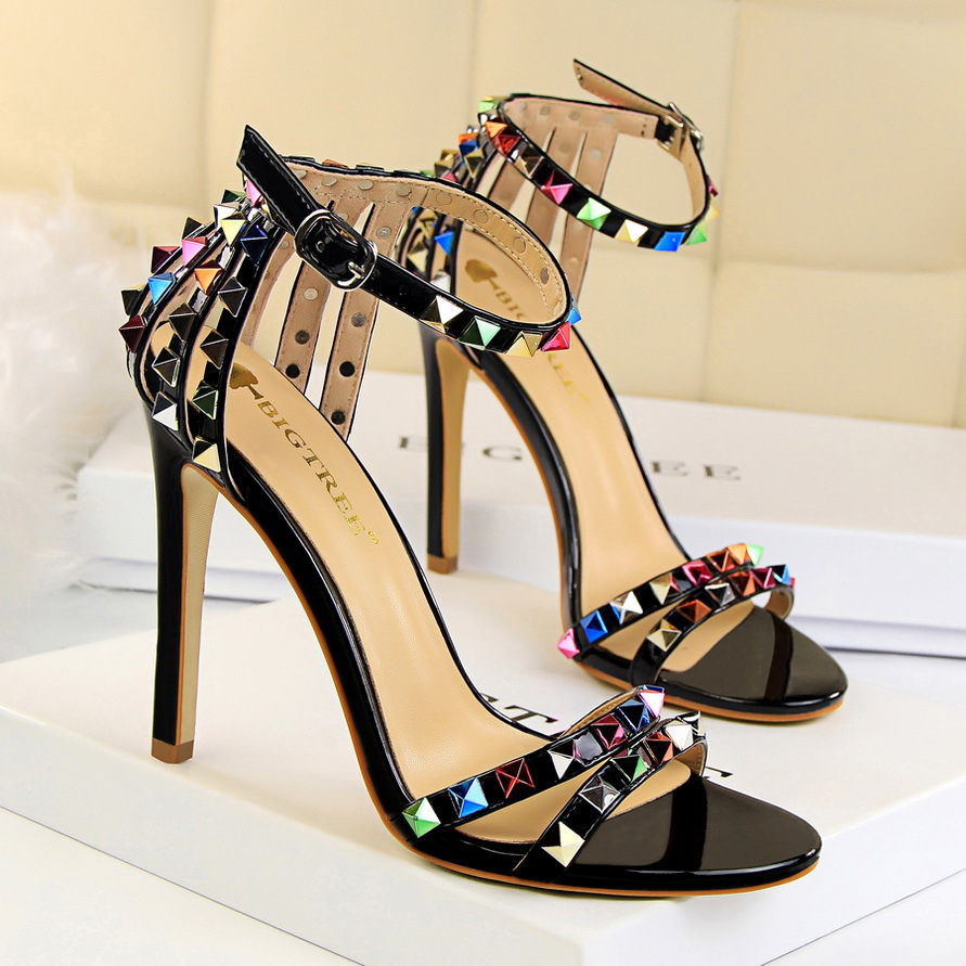 267-2 European and American style Roman style women's shoes stiletto heel ultra high heel open toe strap hollow color rivet sandals