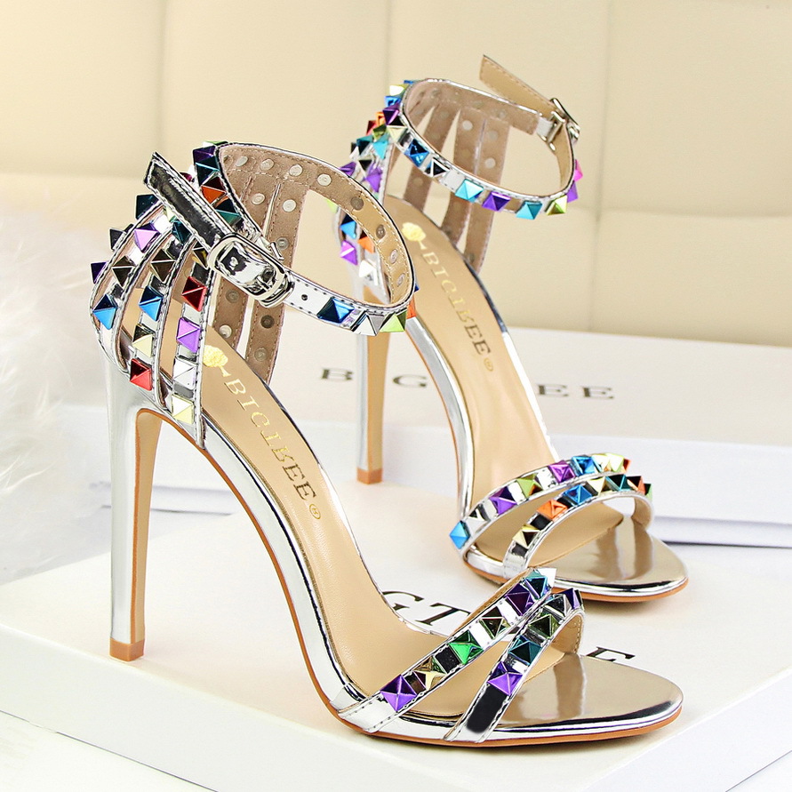 267-2 European and American style Roman style women's shoes stiletto heel ultra high heel open toe strap hollow color rivet sandals