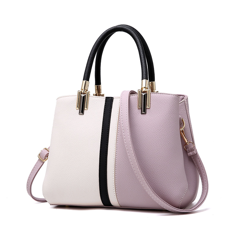 2023 autumn and winter new color matching trend fashion shoulder large capacity handbag casual PU leather women's bag a generation