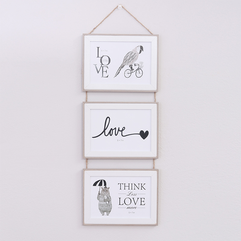 Factory wholesale ns6-inch 7-inch Nordic photo frame wall hanging combination one-piece triple photo frame wall hanging fashion decoration