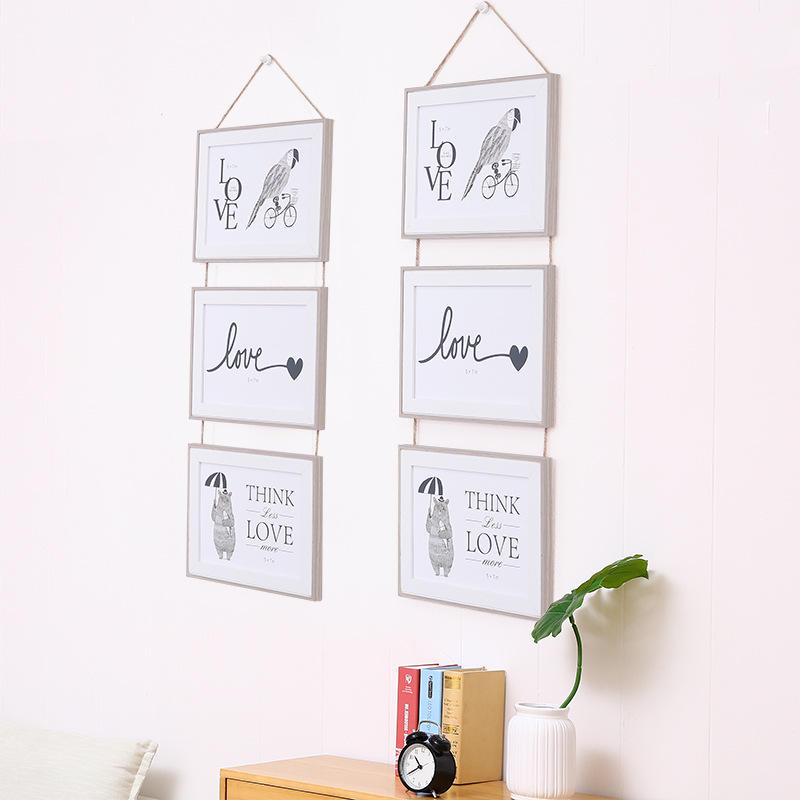 Factory wholesale ns6-inch 7-inch Nordic photo frame wall hanging combination one-piece triple photo frame wall hanging fashion decoration