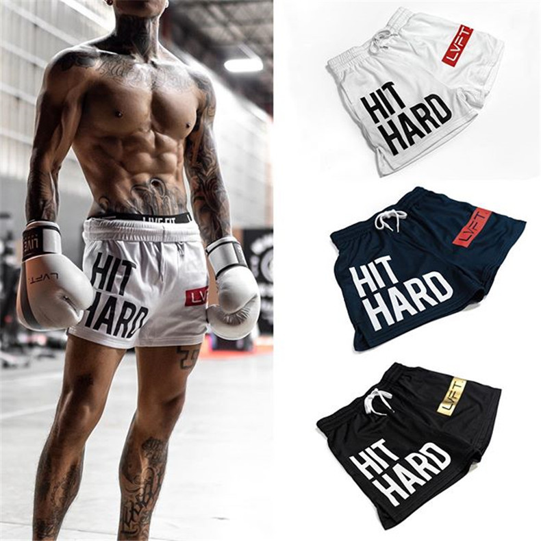 Muscle fitness hot sports three-point fitness pants men's quick-drying breathable pants summer running training shorts