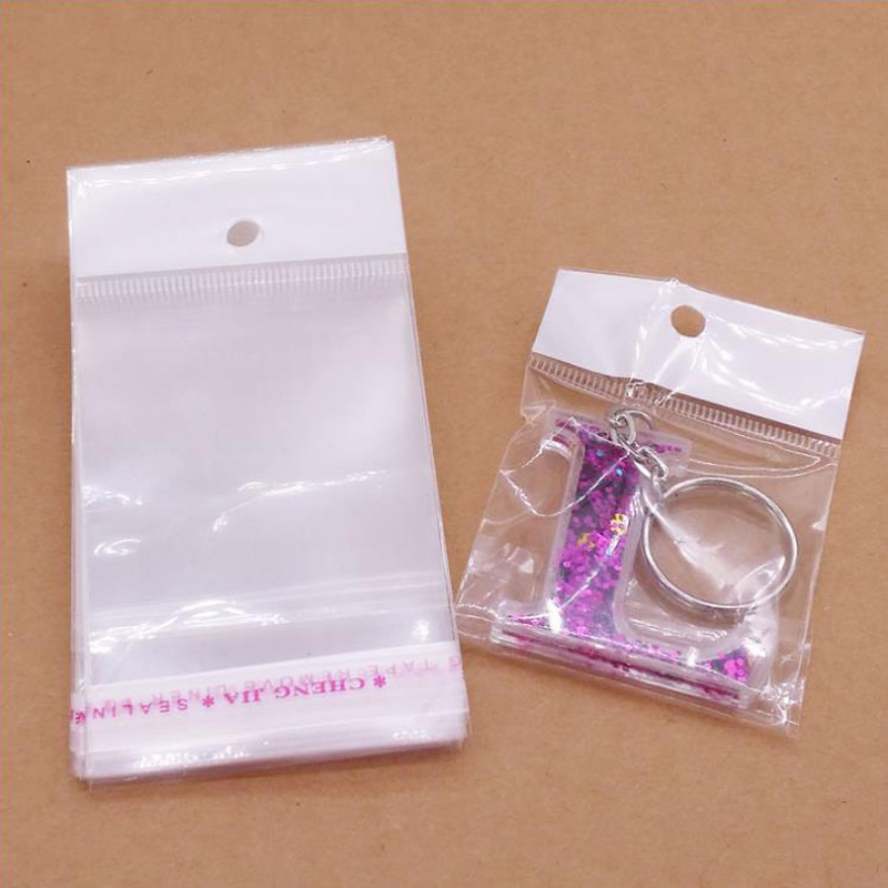 Opp bag aircraft hole round hole pearl film card head bag hanging hole bag transparent plastic bag self-adhesive bag printing logo