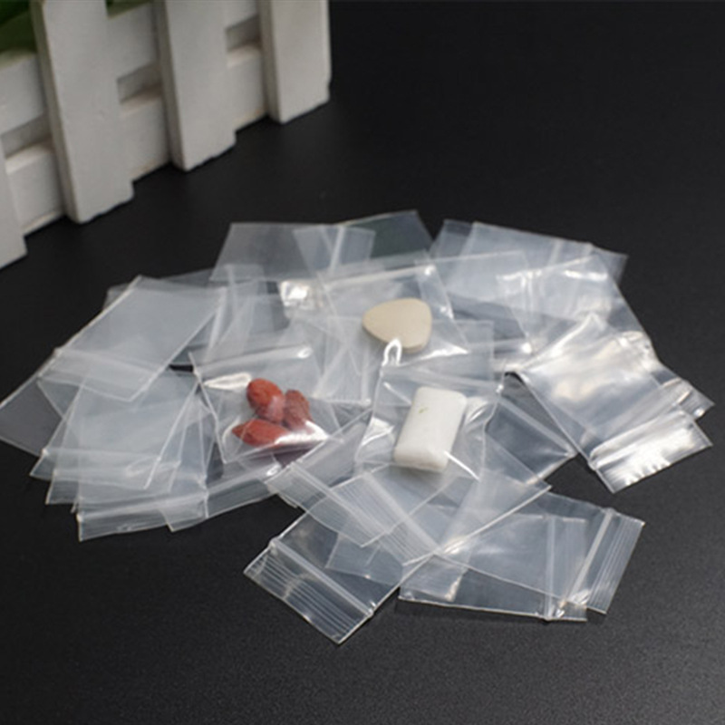 Thickened small size transparent self-sealing bag sealed bag pill diamond earrings packaging bag plastic bag wholesale button bag