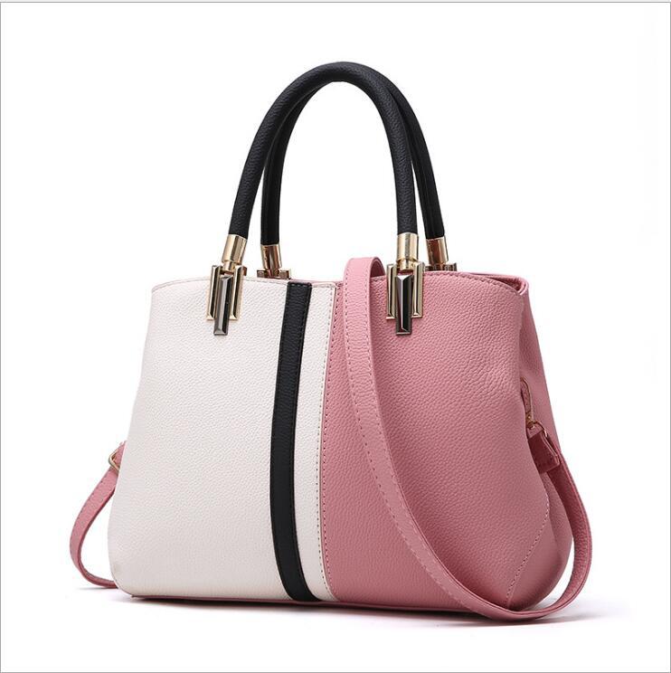 2023 autumn and winter new color matching trend fashion shoulder large capacity handbag casual PU leather women's bag a generation