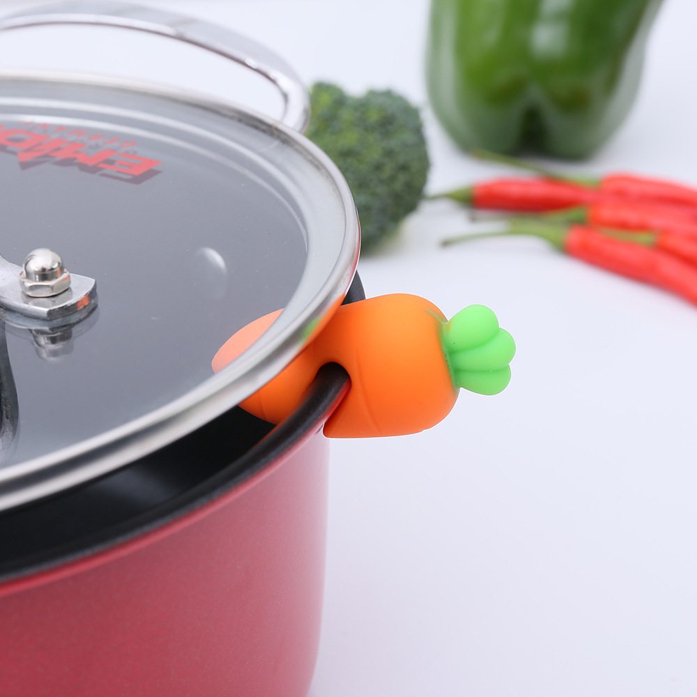 Folding design silicone small carrot pot lid raised spill-proof device kitchen practical gadget cross-border available for sale