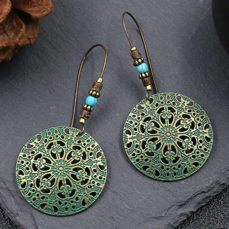 Fashion hot selling retro round earrings women creative flower alloy earrings European and American fashion earrings jewelry wholesale