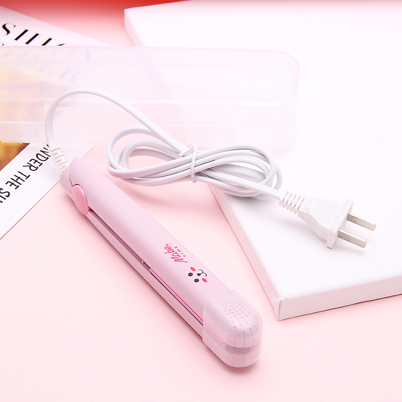 Small household mini portable nougat sealing machine snacks snowflake crisp packaging bag sugar paper plastic sealing machine small splint