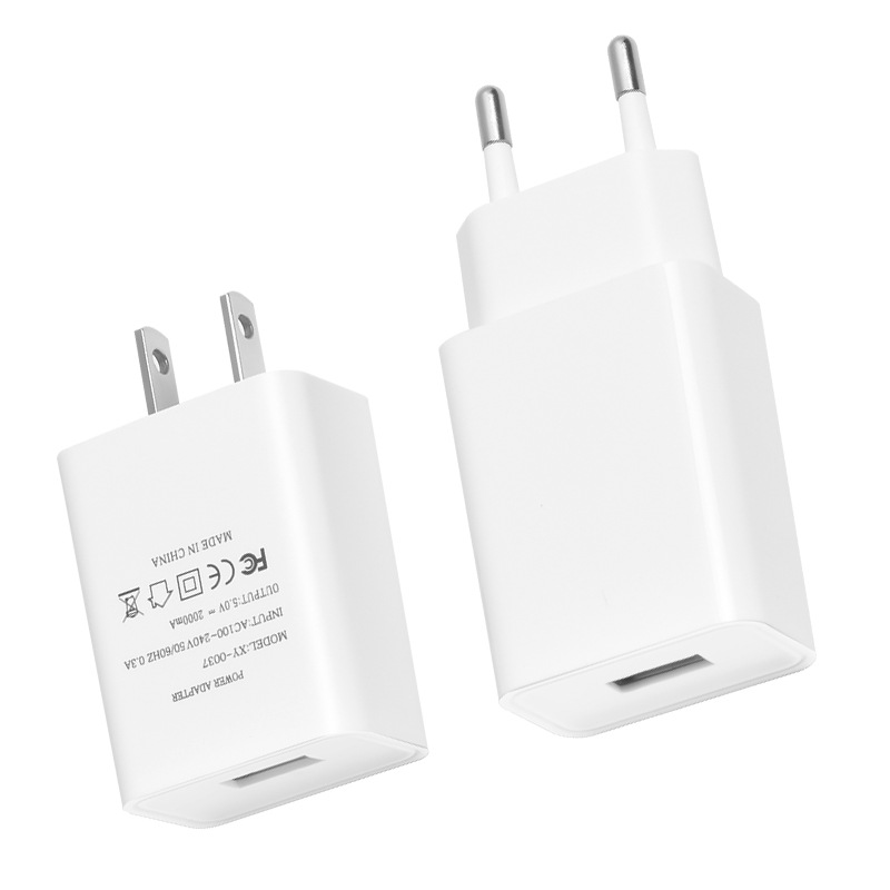 Hot 5V2A charging head mobile phone Bluetooth audio small appliance USB charger European and American gauge power adapter