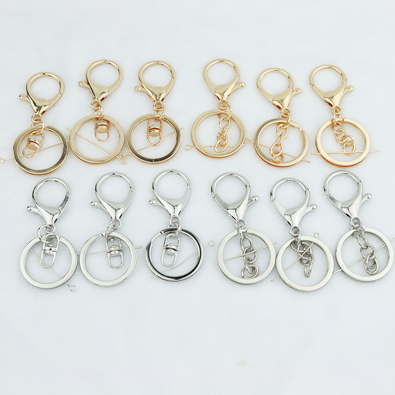 Doll keychain accessories lobster buckle three-piece zinc alloy hanging buckle metal pendant luggage pendant DIY jewelry