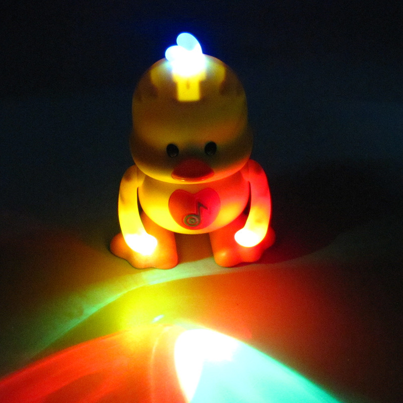 震える音の同じタイプの電動ダンスの小さい萌えアヒルは照明の音楽を揺らして踊ります。|undefined