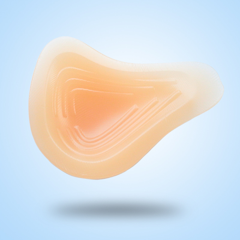 Wholesale 2023 water droplets lengthened thread triangular silicone breast prosthesis after breast surgery a generation of hair