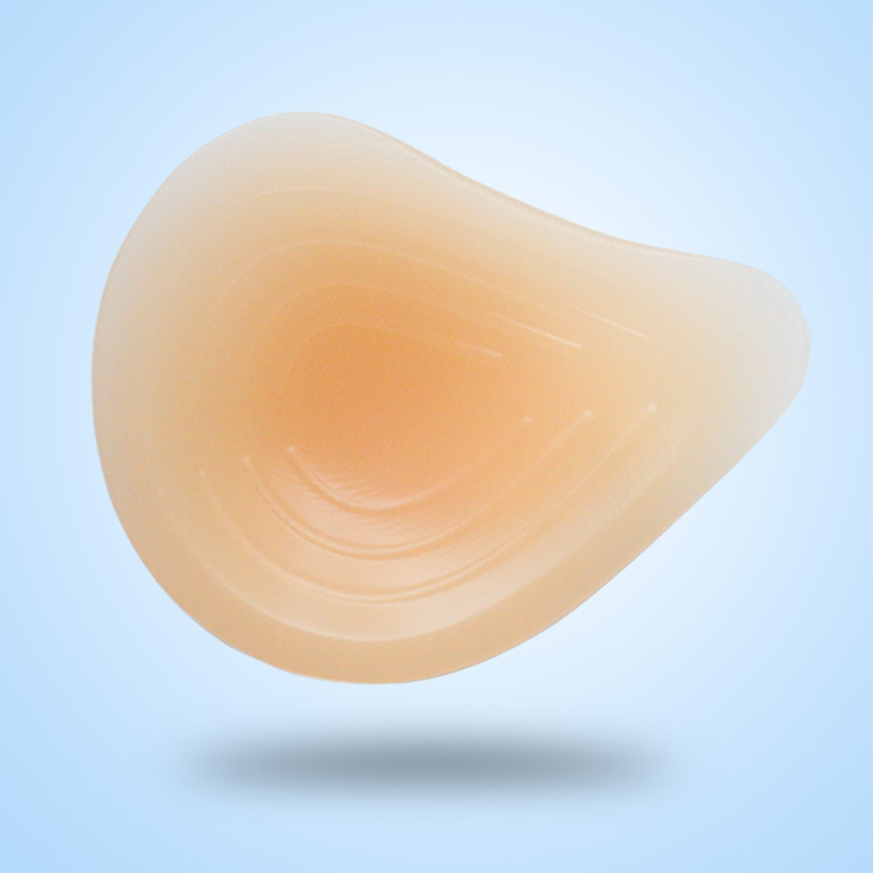 Wholesale 2023 water droplets lengthened thread triangular silicone breast prosthesis after breast surgery a generation of hair