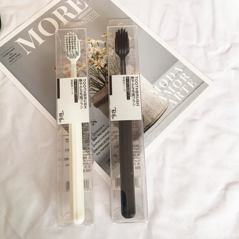 Imported spiral wire toothbrush black and white wide head soft bristle toothbrush single pack toothbrush chain cross-border hot sale factory direct sales
