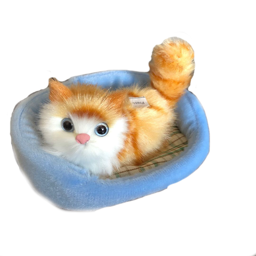 A simulated cat will call an animal ornament when pressed. Children's toys will call a cartoon toy plush toy.