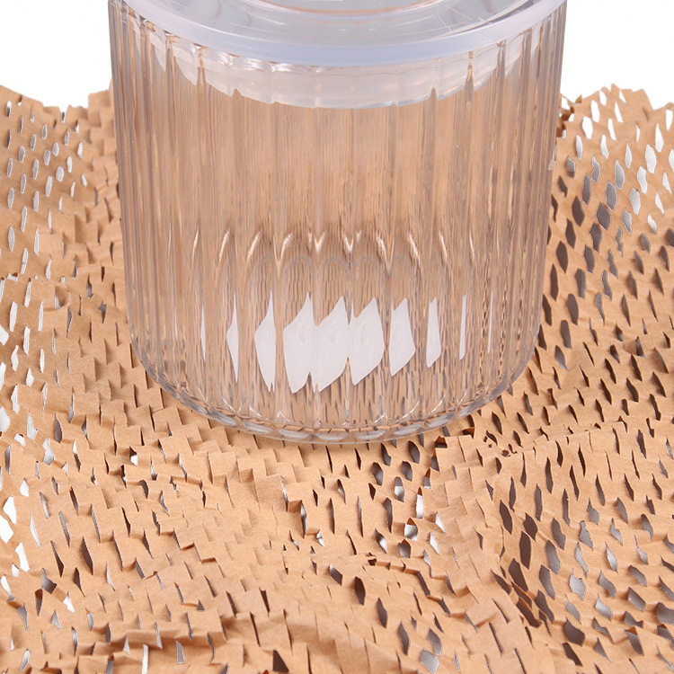 Source factory honeycomb paper packaging Kraft paper express shockproof buffer flowers gift packaging art mesh paper