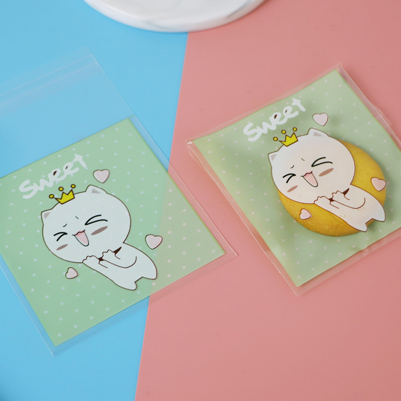 Cartoon self-adhesive bag baking packaging self-sealing bag cookie biscuit bag snack bag candy bag opp jewelry bag self-selling