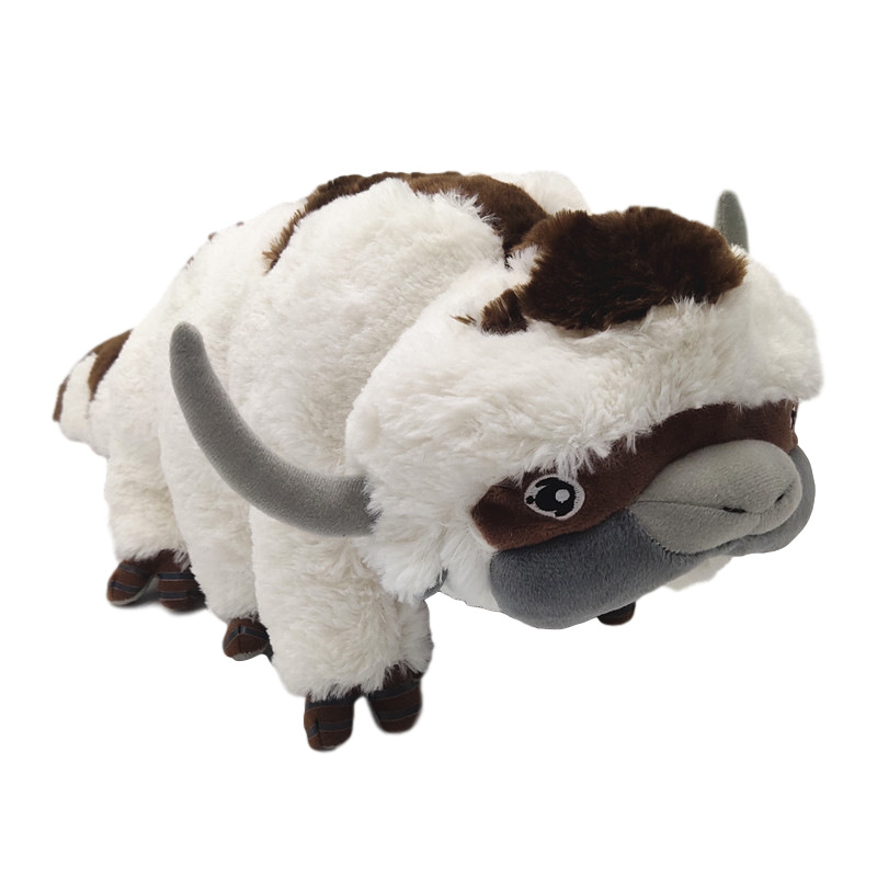 The airbender with supernatural powers and the divine cow, the flying bull, the divine cow plush doll, the Appa cow, the toy bat doll