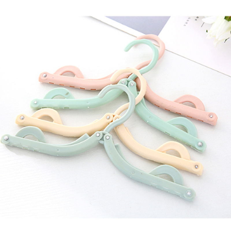 Multi-functional Magic Travel Folding Clothes Hanger Portable Retractable Travel Travel Home Clothes Hanger Small Support Drying