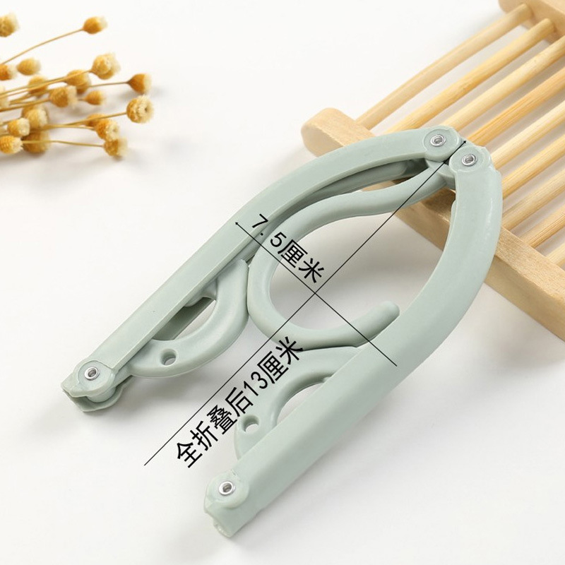 Multi-functional Magic Travel Folding Clothes Hanger Portable Retractable Travel Travel Home Clothes Hanger Small Support Drying