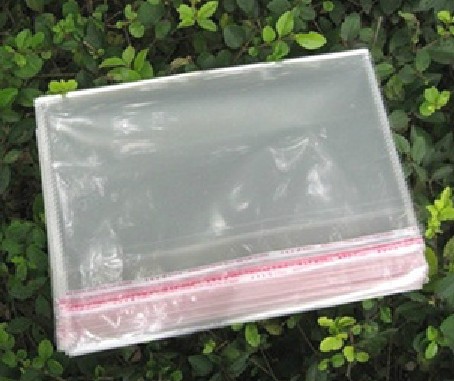 義烏廠家供應5絲28*44CM透明OPP不乾膠自粘袋服裝包裝袋100個每包