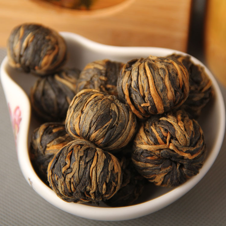Wholesale Fengqing black tea Yunnan black tea tea handmade black tea small golden ball golden pimple red ball single bud tea