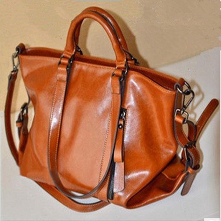 Guangzhou women's bag oil wax leather simple Motorcycle bag ladies hand shoulder diagonal bag a generation of hair