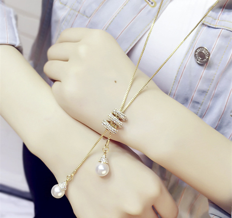 Korean version of the new fashion jewelry sweater chain wholesale all-match high-grade crystal Pearl tassel necklace female pendant
