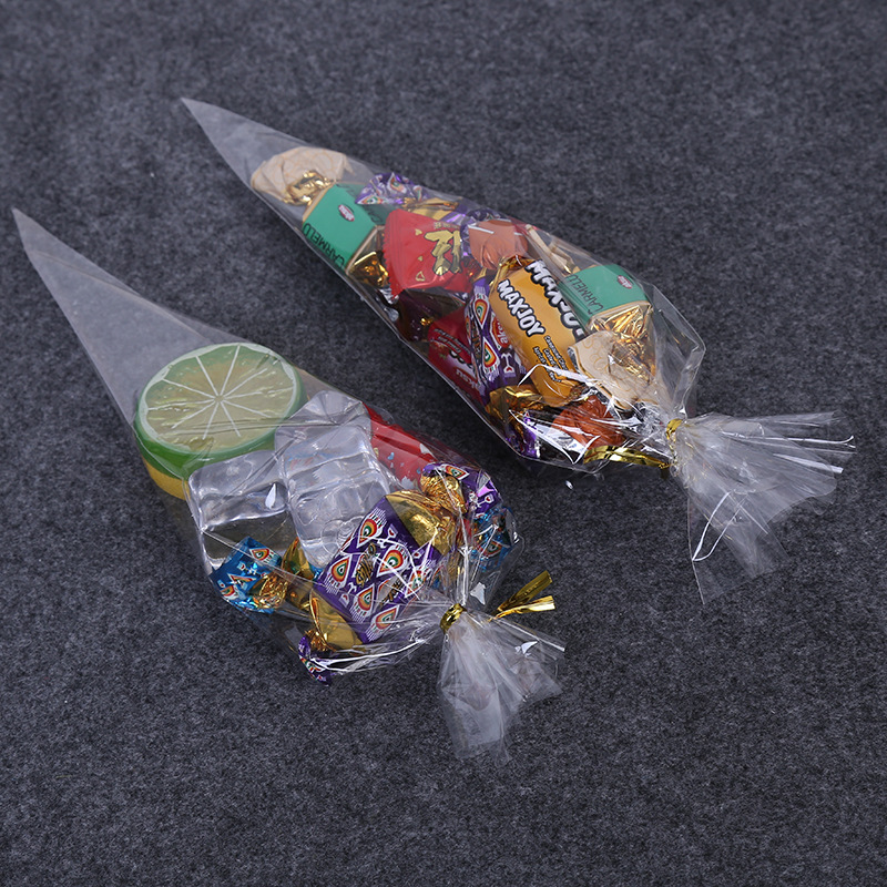 Supply OPP Film plastic bag creative transparent triangle bag candy food packaging bag manufacturers spot wholesale