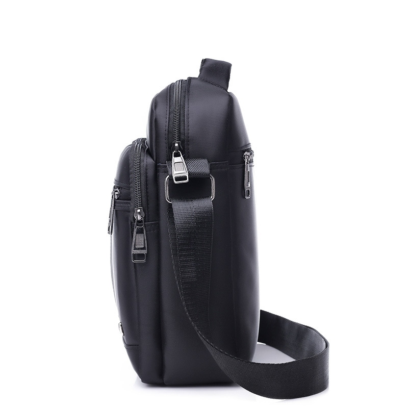 New multi-compartment Oxford cloth shoulder slung men's casual briefcase computer bag vertical satchel factory direct sale