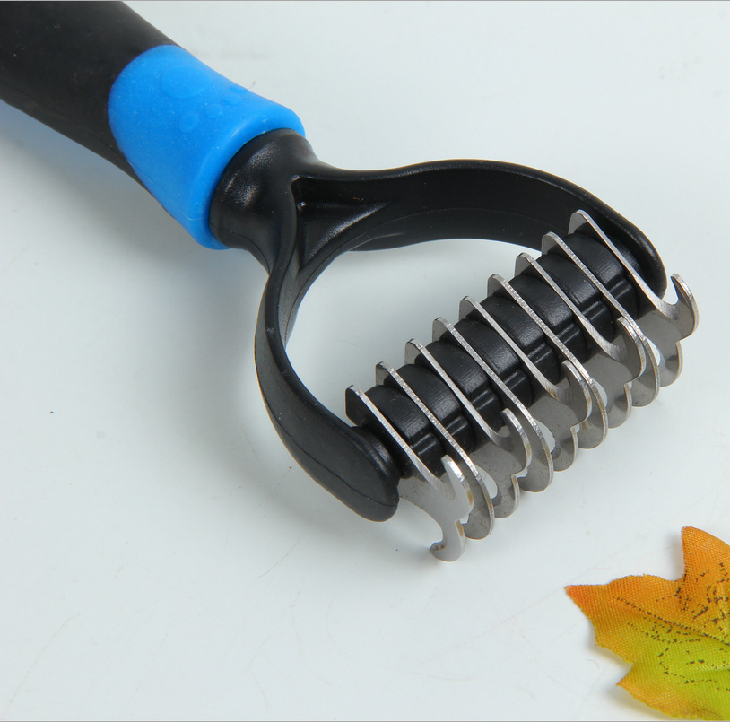 Wholesale pet stainless steel knot opener cat dog teddy bear knot comb medium and large dog comb dog rake comb