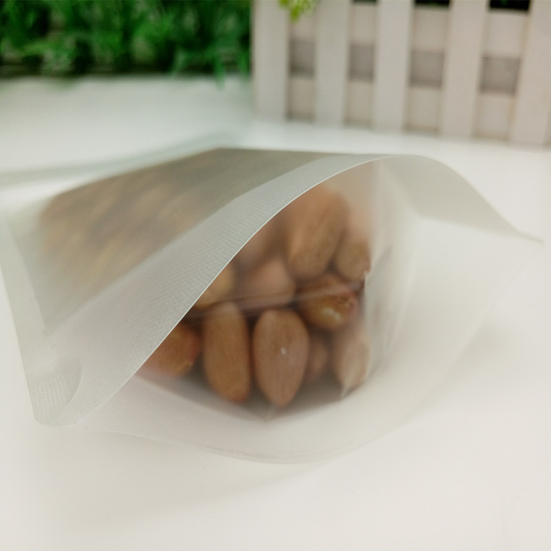 Wholesale matte transparent self-supporting self-sealing bag scented tea candy frosted thickened plastic bag puffed food packaging bag