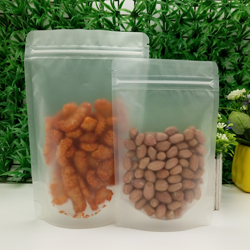 Wholesale matte transparent self-supporting self-sealing bag scented tea candy frosted thickened plastic bag puffed food packaging bag