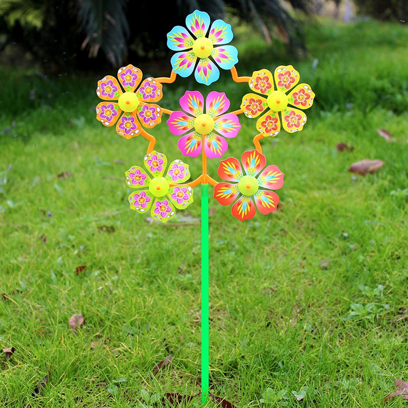 Hot sale gift rotating small size six-wheel children's toy cartoon outdoor decoration plastic colorful windmill stall wholesale