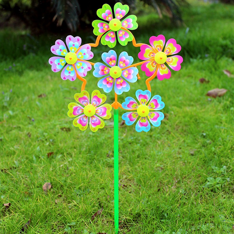 Hot sale gift rotating small size six-wheel children's toy cartoon outdoor decoration plastic colorful windmill stall wholesale