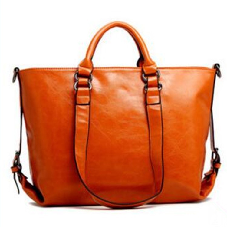 Guangzhou women's bag oil wax leather simple Motorcycle bag ladies hand shoulder diagonal bag a generation of hair