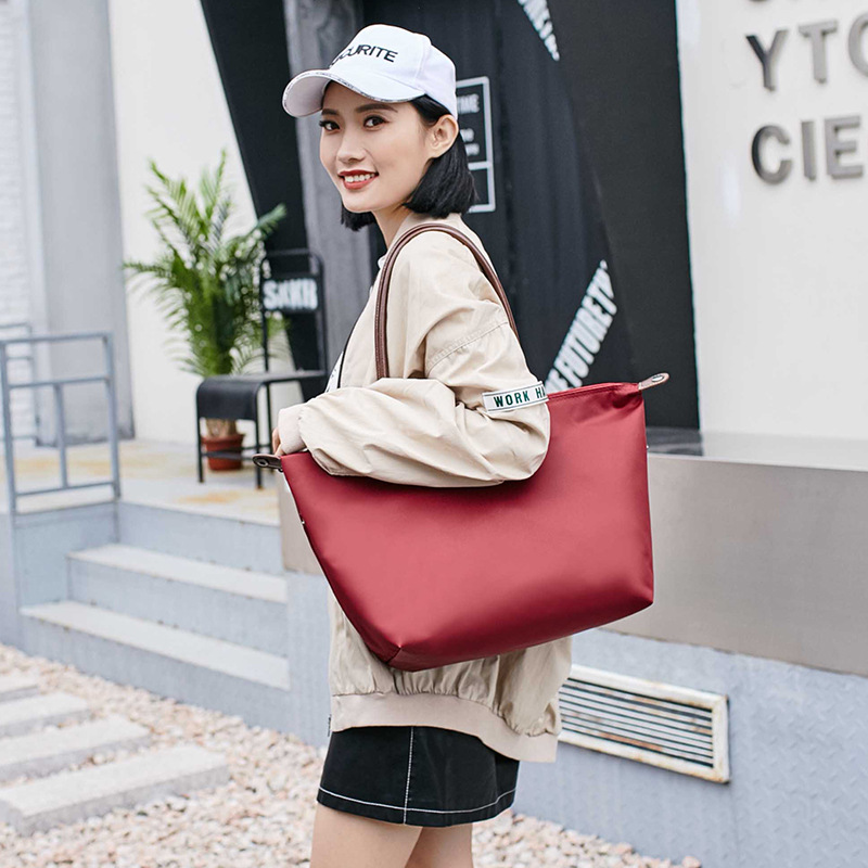 Folding nylon cloth bag portable shoulder bag large capacity women's all-match commuter shoulder bag waterproof wholesale