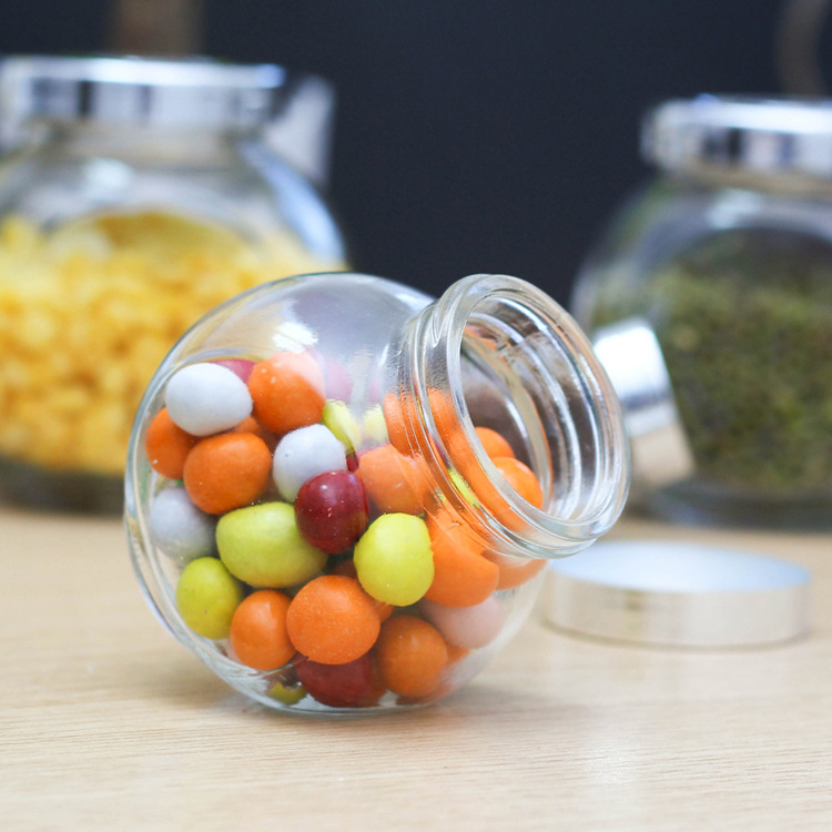 Factory wholesale 180ml flat drum storage tank Lycium ruthenicum packaging bottle glass bottle candy bottle honey bottle with lid