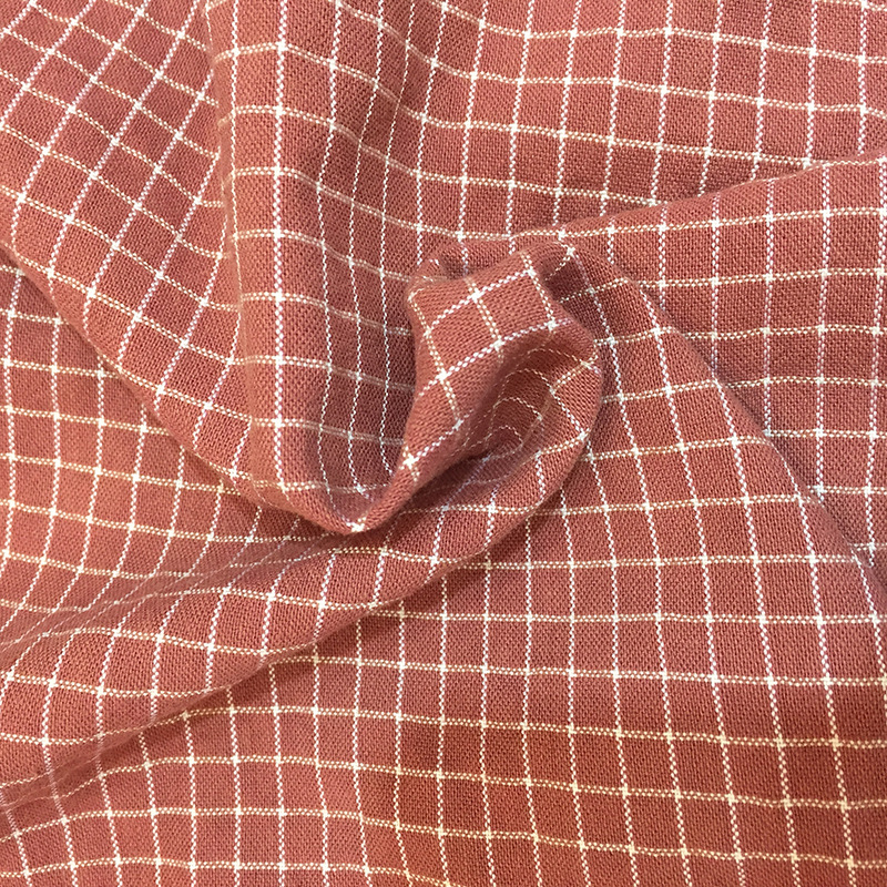 Factory wholesale cotton yarn woven plaid fabric 138cm width family wind jacquard sand wash plaid fabric
