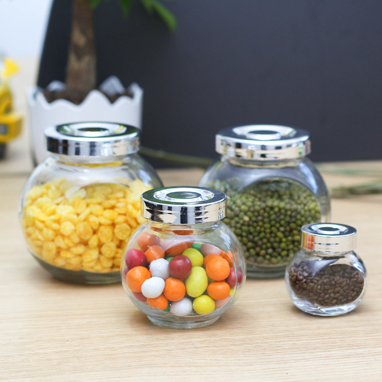 Factory wholesale 180ml flat drum storage tank Lycium ruthenicum packaging bottle glass bottle candy bottle honey bottle with lid