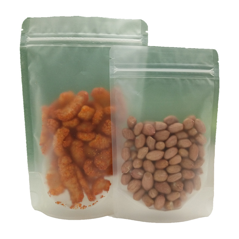 Wholesale matte transparent self-supporting self-sealing bag scented tea candy frosted thickened plastic bag puffed food packaging bag