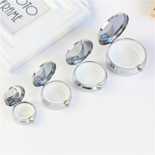 Factory wholesale metal three-compartment one-compartment round detachable pill box portable mini glue drop pill jewelry storage box