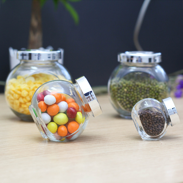 Factory wholesale 180ml flat drum storage tank Lycium ruthenicum packaging bottle glass bottle candy bottle honey bottle with lid