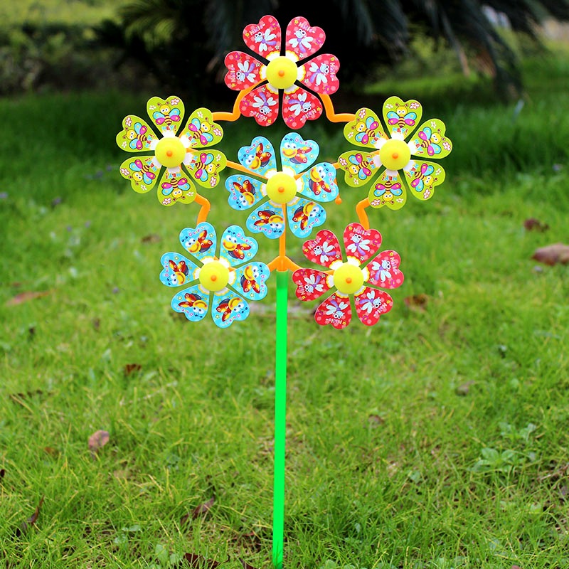 Hot sale gift rotating small size six-wheel children's toy cartoon outdoor decoration plastic colorful windmill stall wholesale