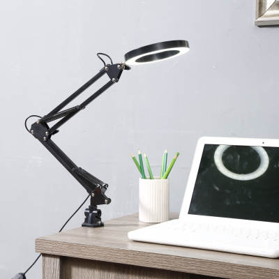 desk lamp with magnifying lens